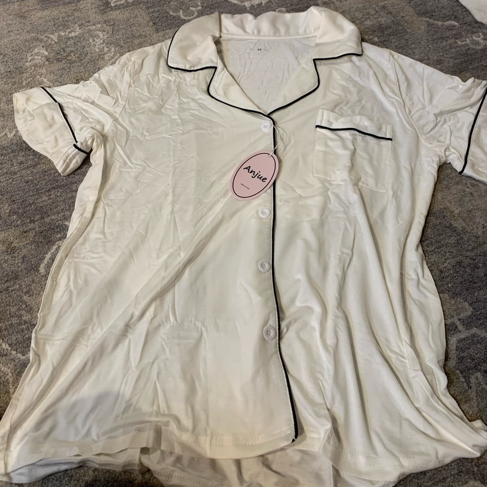 PJ set from Amazon. White with black piping. Size medium.